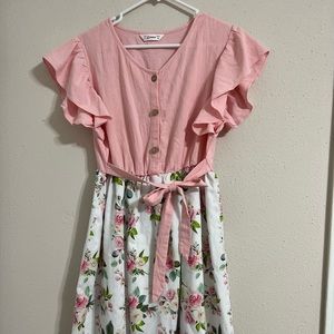 Mother and daughter matching dresses.